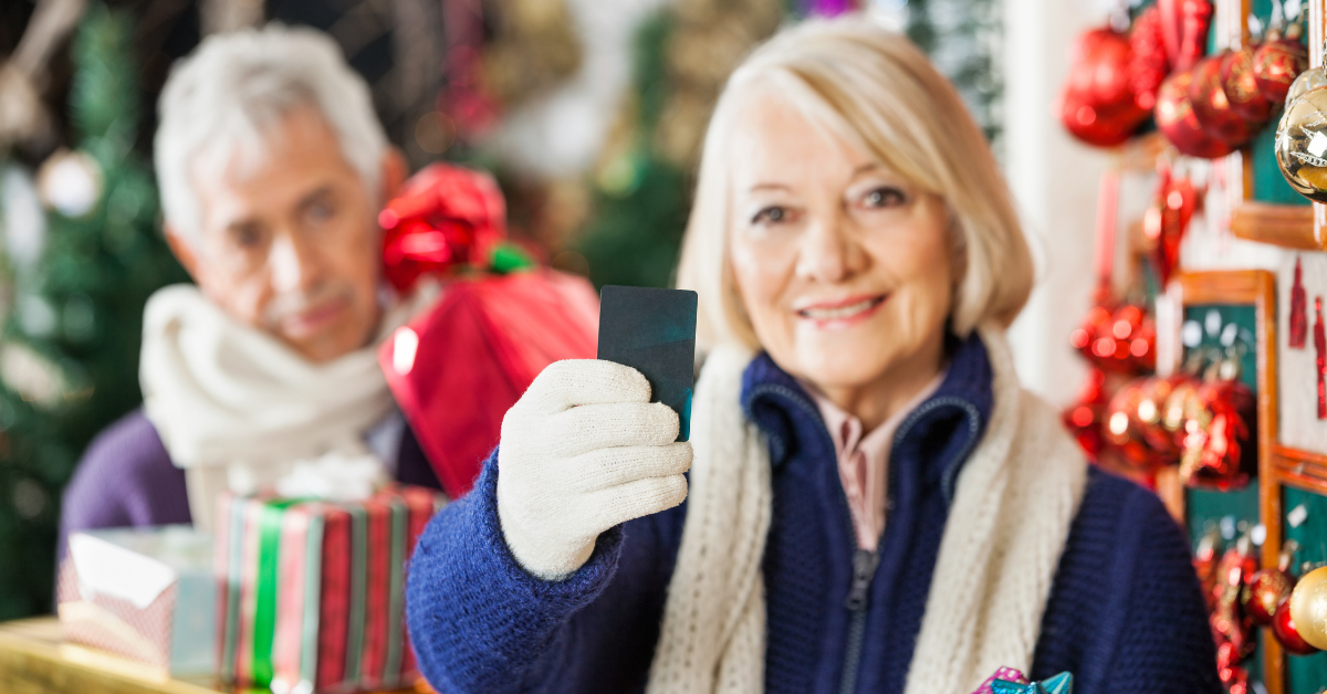 Holiday gift card shoppers browsing ornaments